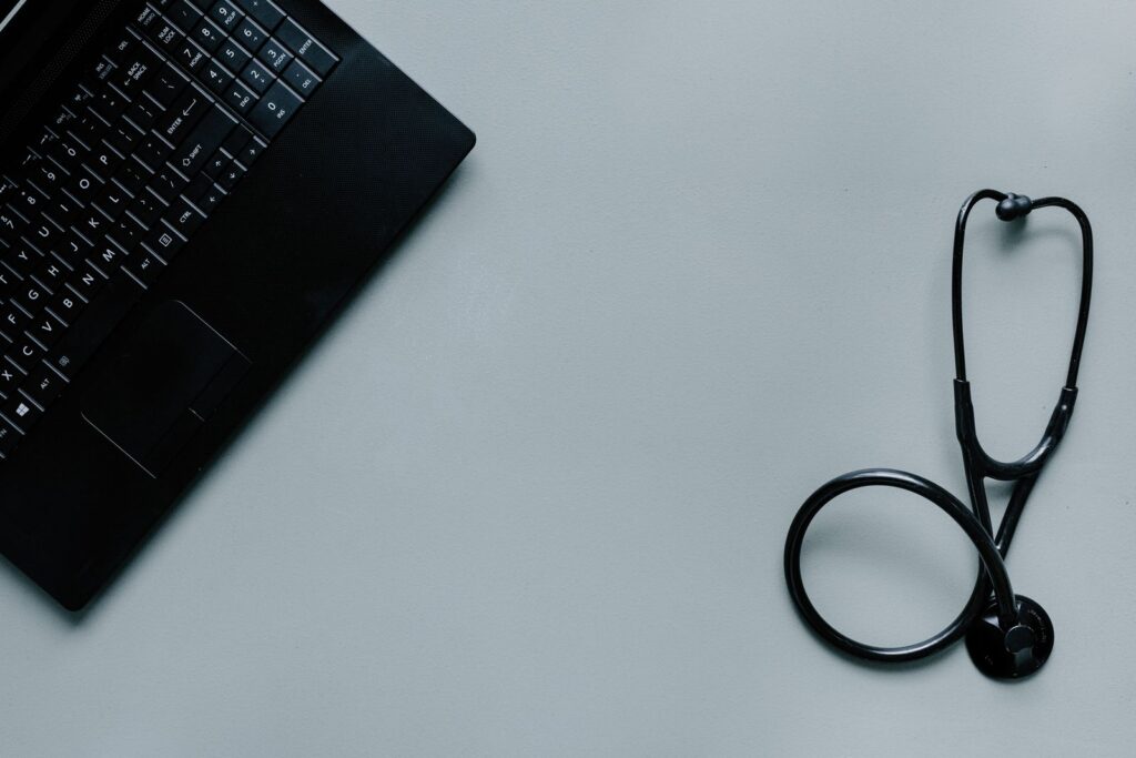Laptop and stethoscope for a telemedicine visit